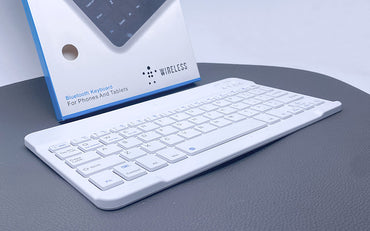 Wireless bluetooth keyboard with plain white packaging
