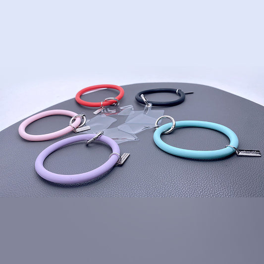 Universal phone carry band charm lanyard